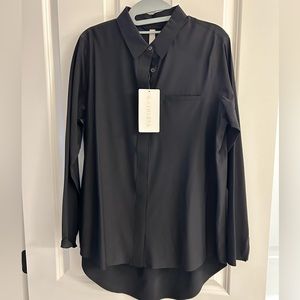 Athleta, long sleeve, black collared shirt, longer length, size small.